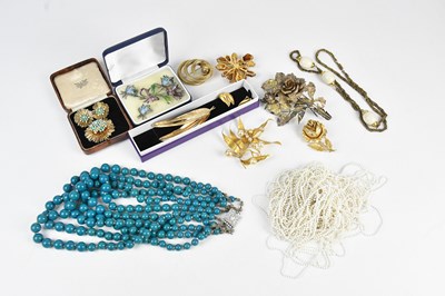 Lot 72 - BOUCHER, PARIS; a c. 1930s navy gold tone...