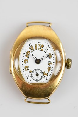Lot 704 - An Art Deco yellow metal wristwatch, the...