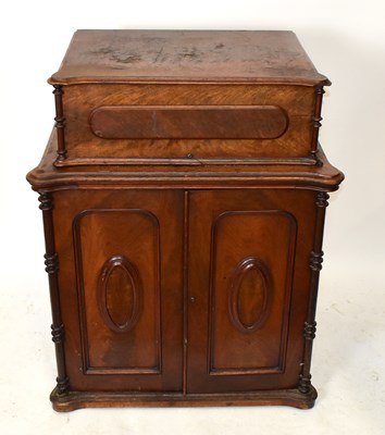 Lot 1620 - BRADBURY & CO; a Victorian cast iron sewing machine mounted in walnut cabinet