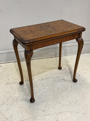 Lot 2066 - An early 20th century walnut card table on...