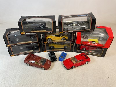 Lot 64 - BURAGO; eight boxed diecast cars, two unboxed...