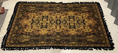 Lot 2162 - A mustard ground Eastern style hand knotted...