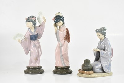 Lot 1155 - LLADRO; three models of Japanese ladies in...