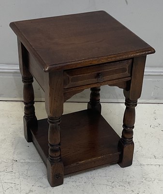 Lot 77 - A reproduction single drawer oak side table,...
