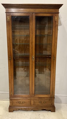 Lot 13 - A reproduction oak display cabinet, height...