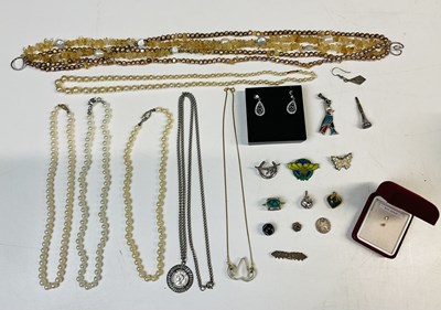 Lot 777 - A small group of costume jewellery including...