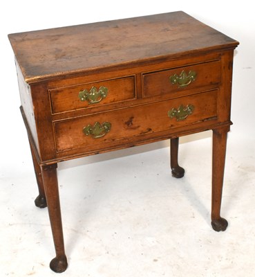 Lot 1585 - An 18th century 'red walnut' lowboy