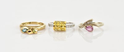 Lot 2473 - A 14ct white gold diamond and citrine dress...