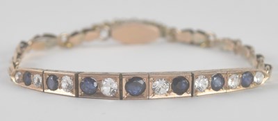Lot 1412 - A Victorian yellow metal diamond and sapphire...