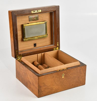 Lot 225 - A decorative modern walnut humidor containing...
