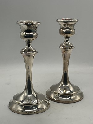Lot 632 - A pair of George V loaded hallmarked silver...