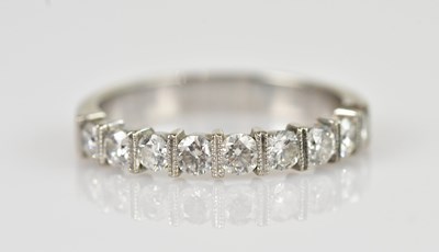 Lot 2357 - A white metal diamond set nine stone half...