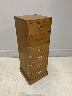 Lot 152 - A modern brass bound pine chest of six drawers...