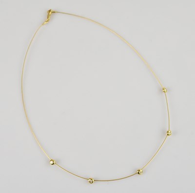 Lot 2232 - An 18ct yellow gold fine link necklace, set...