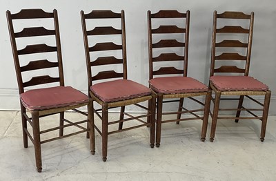 Lot 131 - A set of four early 20th century rush seated...