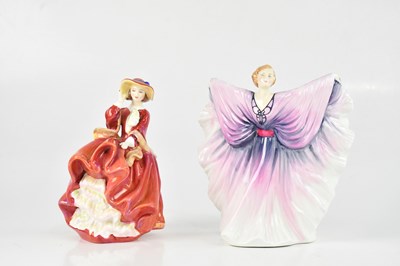 Lot 1162 - ROYAL DOULTON; two figures comprising 'Isadora'...