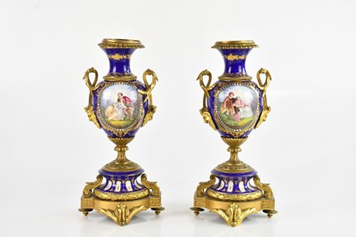 Lot 1009 - IN THE MANNER OF SÈVRES; a pair of gilt and...