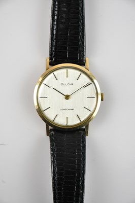 Lot 415 - BULOVA; a 9ct yellow gold cased 'Longchamp'...