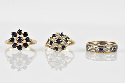 Lot 2505 - Two 9ct yellow gold cluster rings, including...
