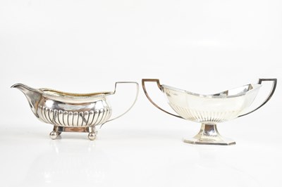 Lot 251 - I E T; a Georgian hallmarked silver cream jug,...