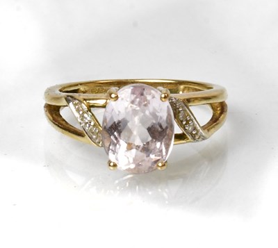 Lot 830 - A 9ct yellow gold ring set with a pink kunzite...