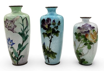 Lot 1037 - Three Japanese ginbari cloisonné enamel floral...