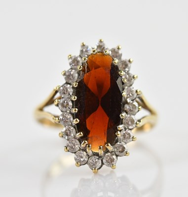 Lot 369 - A 9ct yellow gold cluster ring with central...