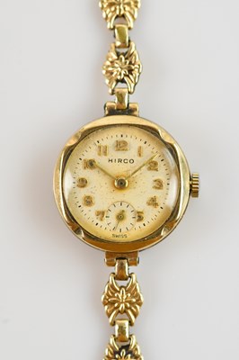 Lot 419 - HIRCO; a 9ct yellow gold lady's wristwatch, on...