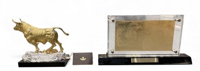 Lot 303 - CUBIC GEMS; a modern gold plated and...