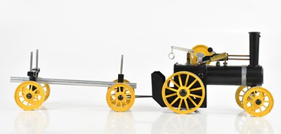 Lot 165E - MAMOD; a steam tractor with log trailer.