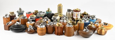 Lot 2246 - A large collection of wood and ceramic lighters.