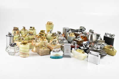 Lot 2247 - A large collection of onyx and metal lighters.
