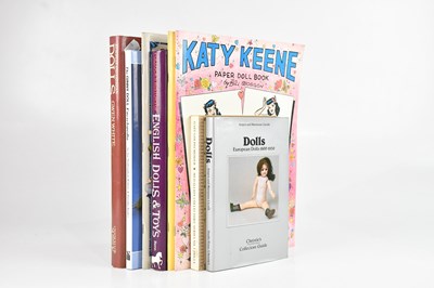 Lot 1581 - A collection of eight doll related books...