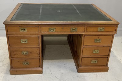 Lot 2009 - A late 19th century pine partner's desk from...