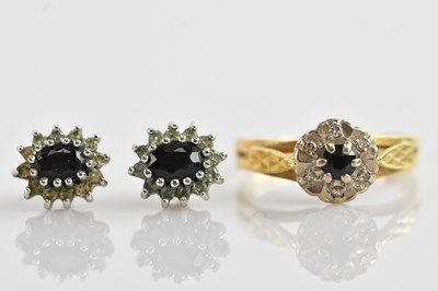 Lot 594 - An 18ct yellow gold illusion set diamond and...