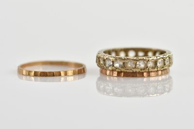 Lot 678 - A 9ct yellow gold textured wedding band, size...