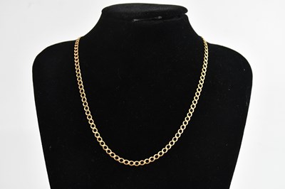 Lot 380 - A yellow metal curb link necklace stamped '375'...