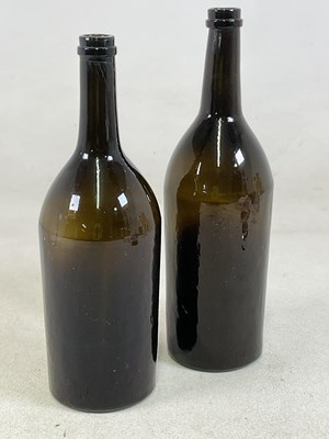 Lot 117 - Two 19th century hand blown brown/green tinted...