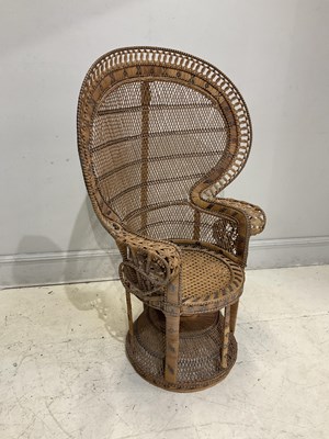 Lot 2099 - A wicker peacock chair, height 139cm, width 99cm.