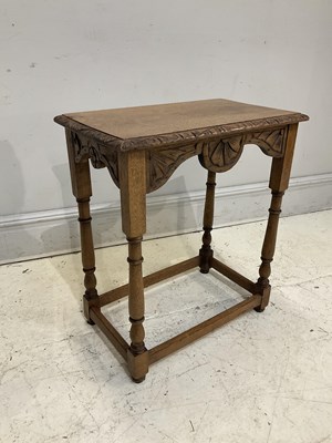 Lot 2007 - A reproduction light oak side table, height...