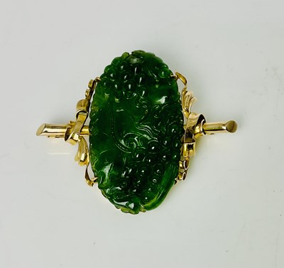 Lot 652 - A large Chinese yellow metal and carved jade...