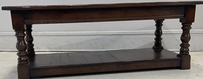 Lot 84 - A reproduction oak coffee table, height 45cm,...