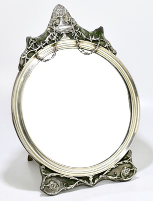 Lot 2210 - WILLIAM COMYNS; a Edward VII hallmarked silver...
