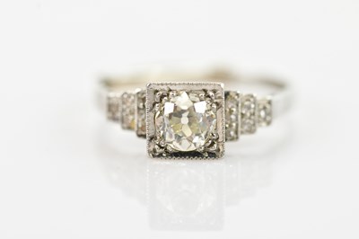 Lot 469 - A white metal Art Deco diamond solitaire dress...