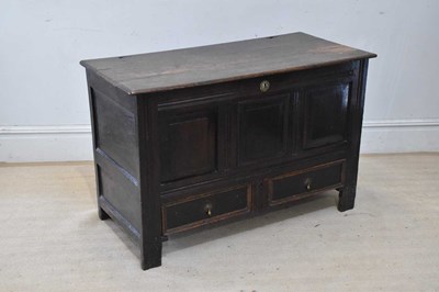Lot 2003 - An 18th century oak mule chest, the hinged top...