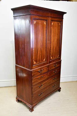 Lot 2011 - A George III inlaid mahogany linen press, with...