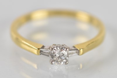 Lot 1237 - An 18ct yellow gold diamond solitaire ring,...