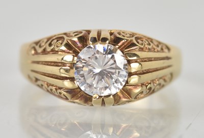 Lot 1246 - A 9ct yellow gold white stone set solitaire...