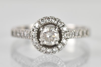 Lot 1238 - A platinum diamond set solitaire ring, the...
