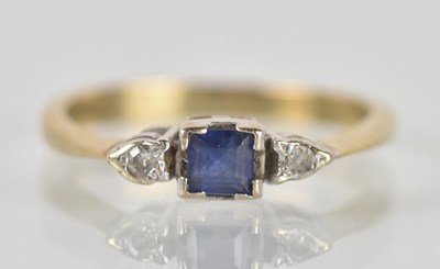 Lot 1283 - A 9ct yellow gold sapphire and diamond three...